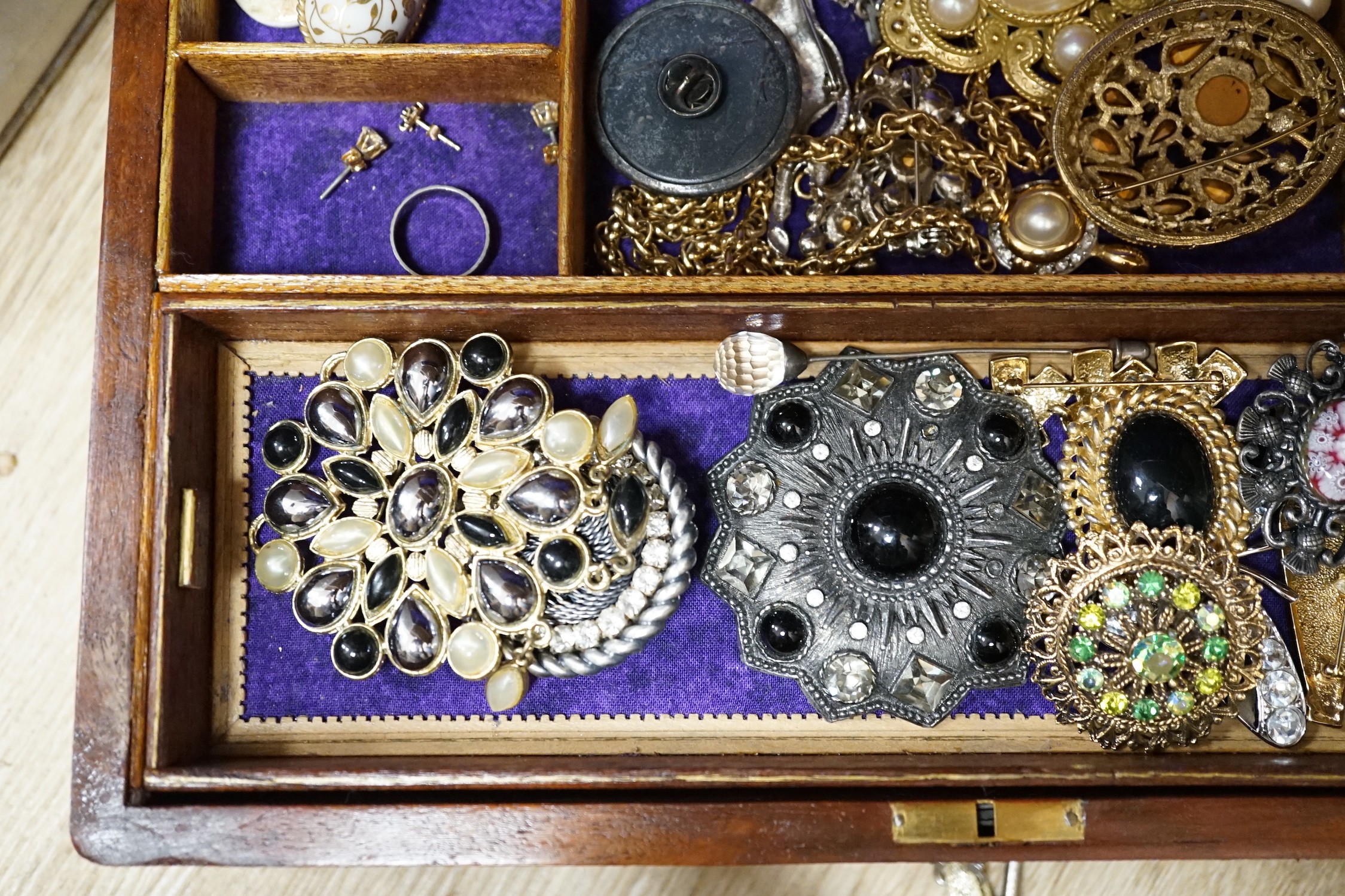 Assorted costume jewellery and wrist watches.